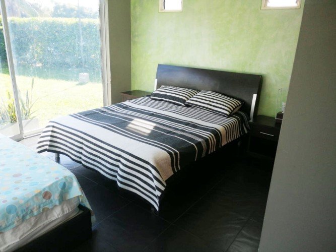 cama de nuestra hermosa casa vacacional Ricaurte Cundinamarca Colombia InmobiliariaCol